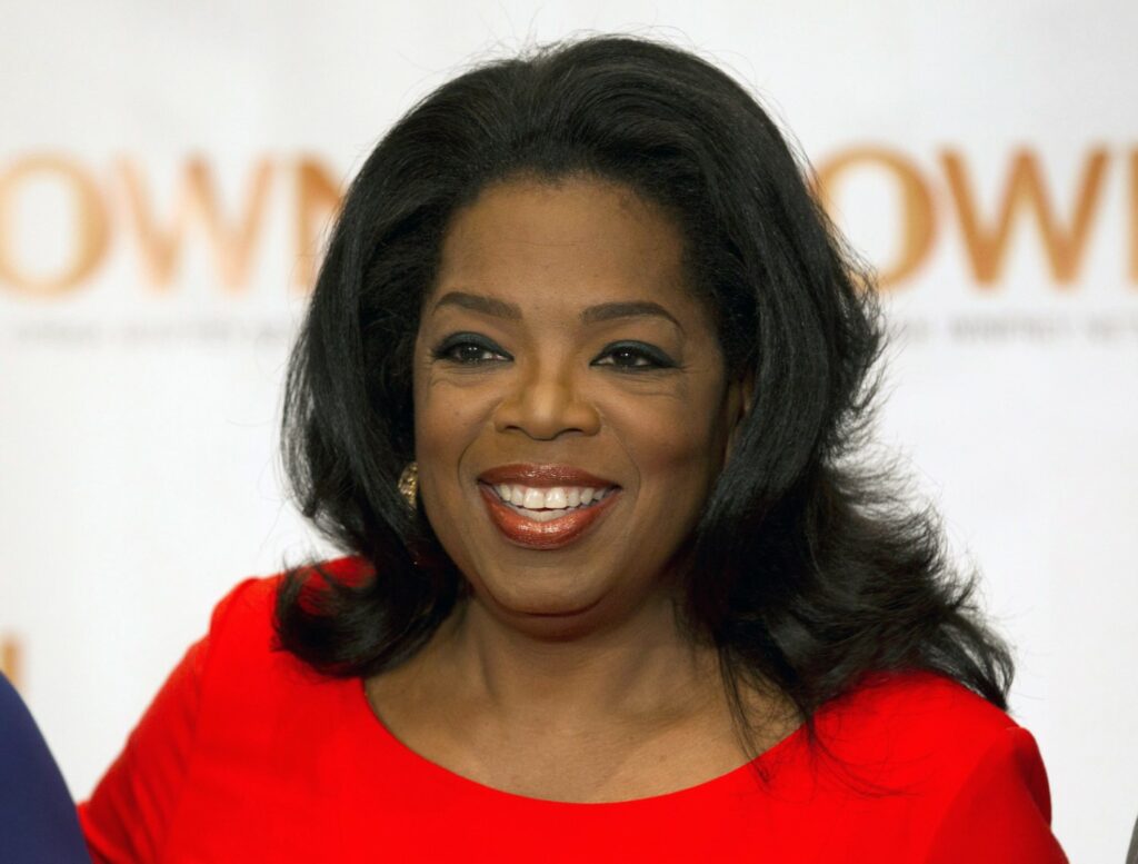 FILE - This April 16, 2012 file photo shows Oprah Winfrey in Toronto. Winfrey announced Wednesday, Dec. 5, that she has chosen a debut novel for her book club, The Twelve Tribes of Hattie, by Ayana Mathis. An author interview will be aired Feb. 3, 2013 on Winfrey's OWN network. (AP Photo/The Canadian Press, Frank Gunn, file)