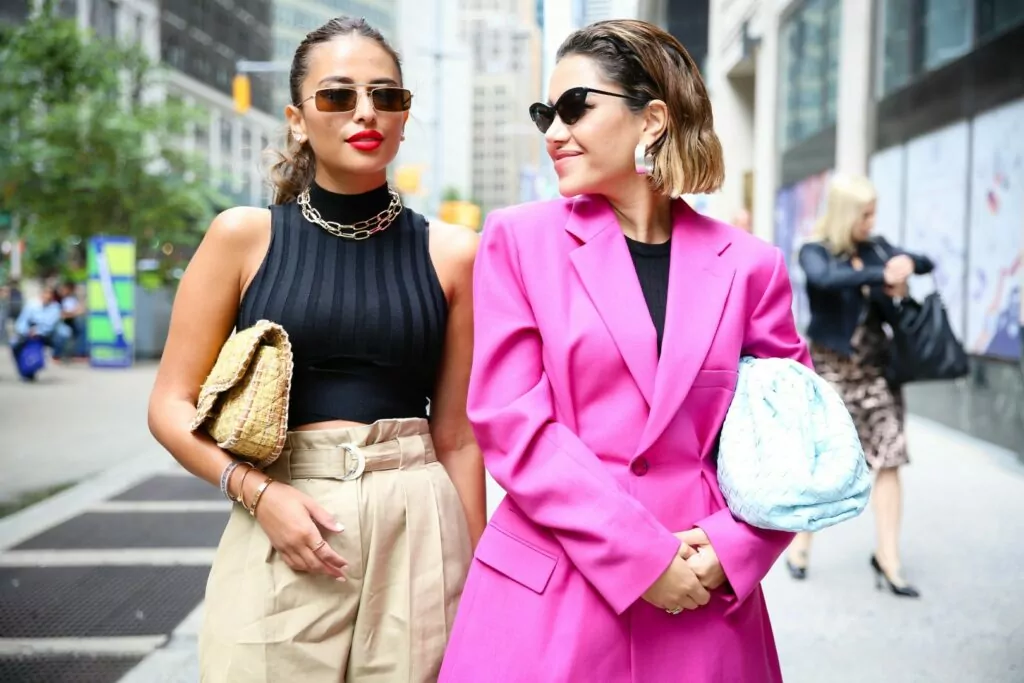 NEW YORK, NEW YORK - SEPTEMBER 07: Two guests pose during New York Fashion Week at Gotham Hall on September 07, 2019 in New York City. (Photo by Donell Woodson/Getty Images)