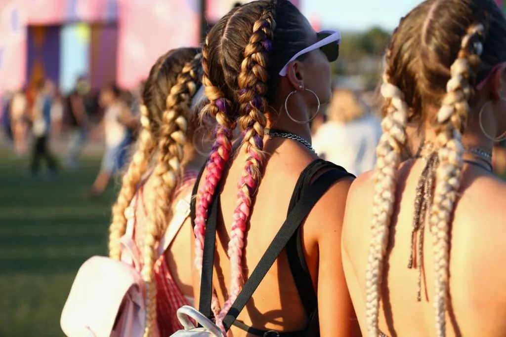 INDIO, CA - APRIL 22: Braided hair detail of festivalgoers during day 2 of the 2017 Coachella Valley Music & Arts Festival (Weekend 2) at the Empire Polo Club on April 22, 2017 in Indio, California. (Photo by Rich Fury/Getty Images for Coachella)