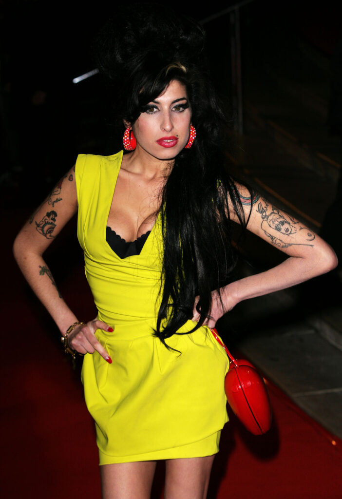 LONDON - FEBRUARY 14: Singer Amy Winehouse arrives at the BRIT Awards 2007 in association with MasterCard at Earls Court on February 14, 2007 in London. (Photo by Gareth Cattermole/Getty Images)
