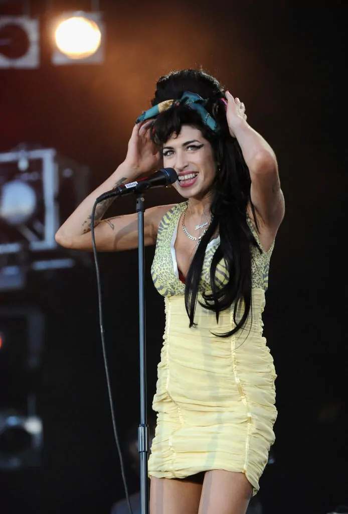 ARGANDA DEL REY, SPAIN - JULY 04: Amy Winehouse performs on stage during Rock in Rio Day 3 on July 04, 2008 near Madrid in Arganda del Rey, Spain. (Photo by Carlos Alvarez/Getty Images)