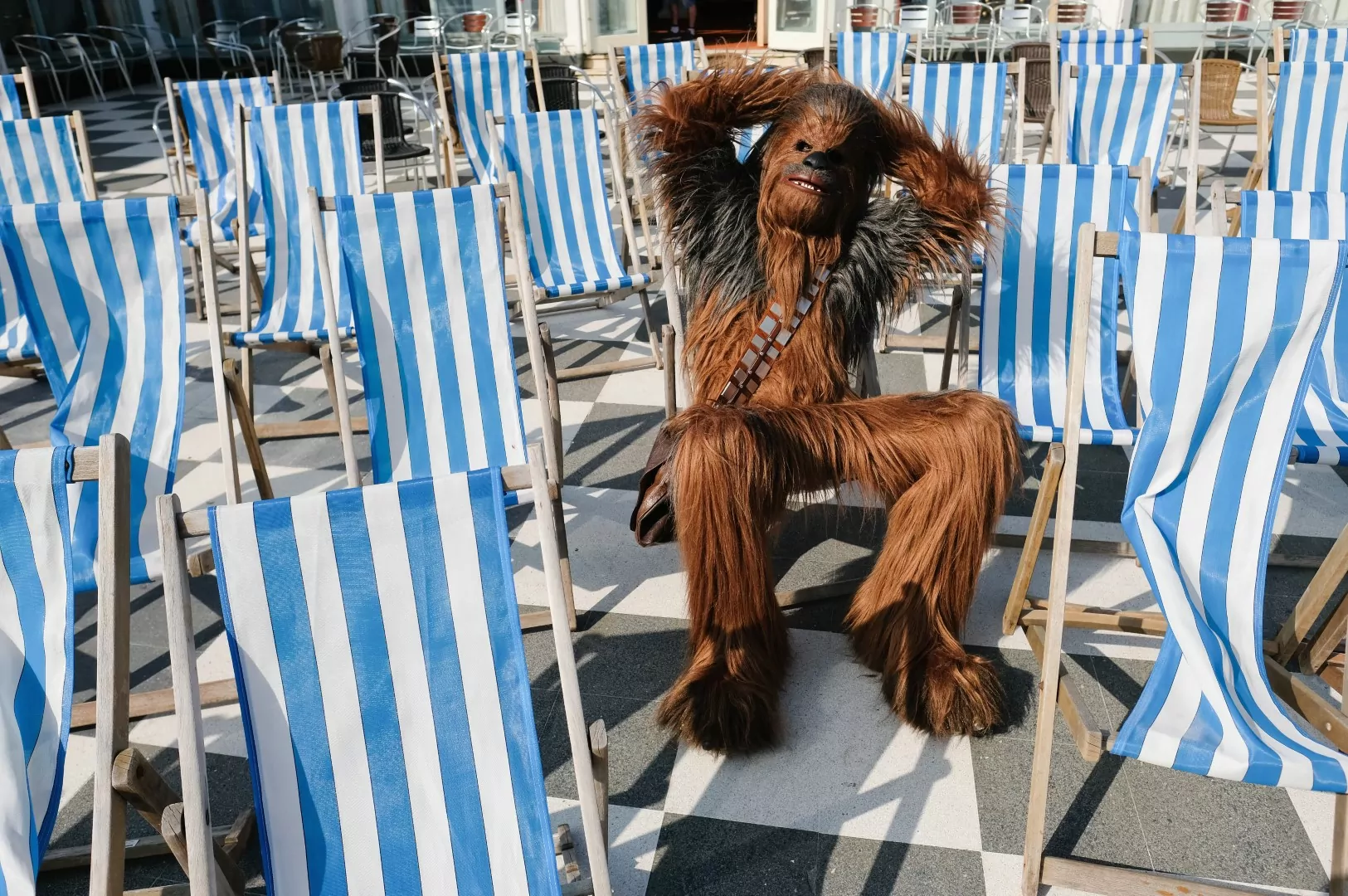 SCARBOROUGH, ENGLAND - APRIL 21: Will Hyde from Darlington relaxes as Chewbacca as he attends the Scarborough Sci-Fi event held at the seafront Spa Complex on April 21, 2018 in Scarborough, England. The North Yorkshire seaside town hosted the event for the fifth year and saw many areas of Sci-Fi fandom provided to entertain visitors including guest star appearances, gaming, cosplay, props, comic books and other merchandise stalls with many of those attending wearing costumes and outfits of their favourite Sci-Fi characters. (Photo by Ian Forsyth/Getty Images)