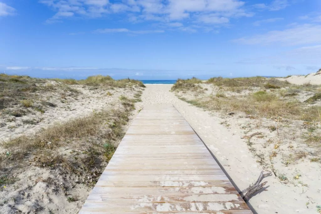 View of the wooden walkway at the entrance to Carnota beach. Galicia
