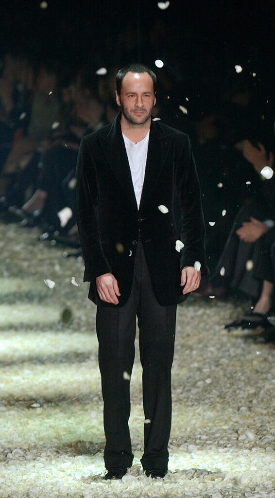 MILAN, ITALY - MARCH 1: American designer Tom Ford walks down the runway after the Gucci Autumn/Winter 2003-2004 collection fashion show March 1, 2003 in Milan, Italy. (Photo by Giuseppe Cacace/Getty Images)