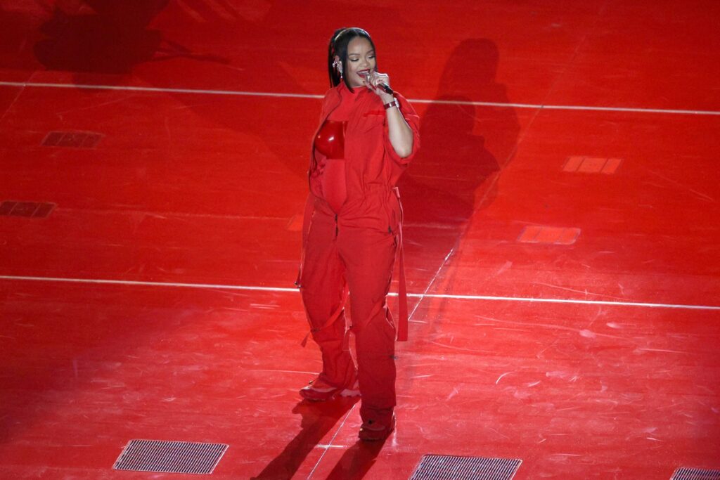 GLENDALE, ARIZONA - FEBRUARY 12: Rihanna performs onstage during the Apple Music Super Bowl LVII Halftime Show at State Farm Stadium on February 12, 2023 in Glendale, Arizona. (Photo by Rob Carr/Getty Images)